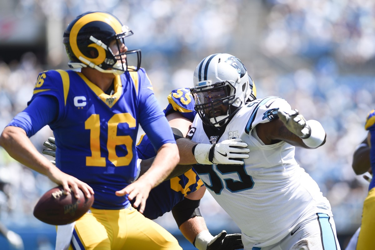 Rams quarterback Jared Goff (16) looks to pass as Carolina Panthers defensive tackle Kawann Short (99) pressures. Mandatory Credit: Bob Donnan-USA TODAY