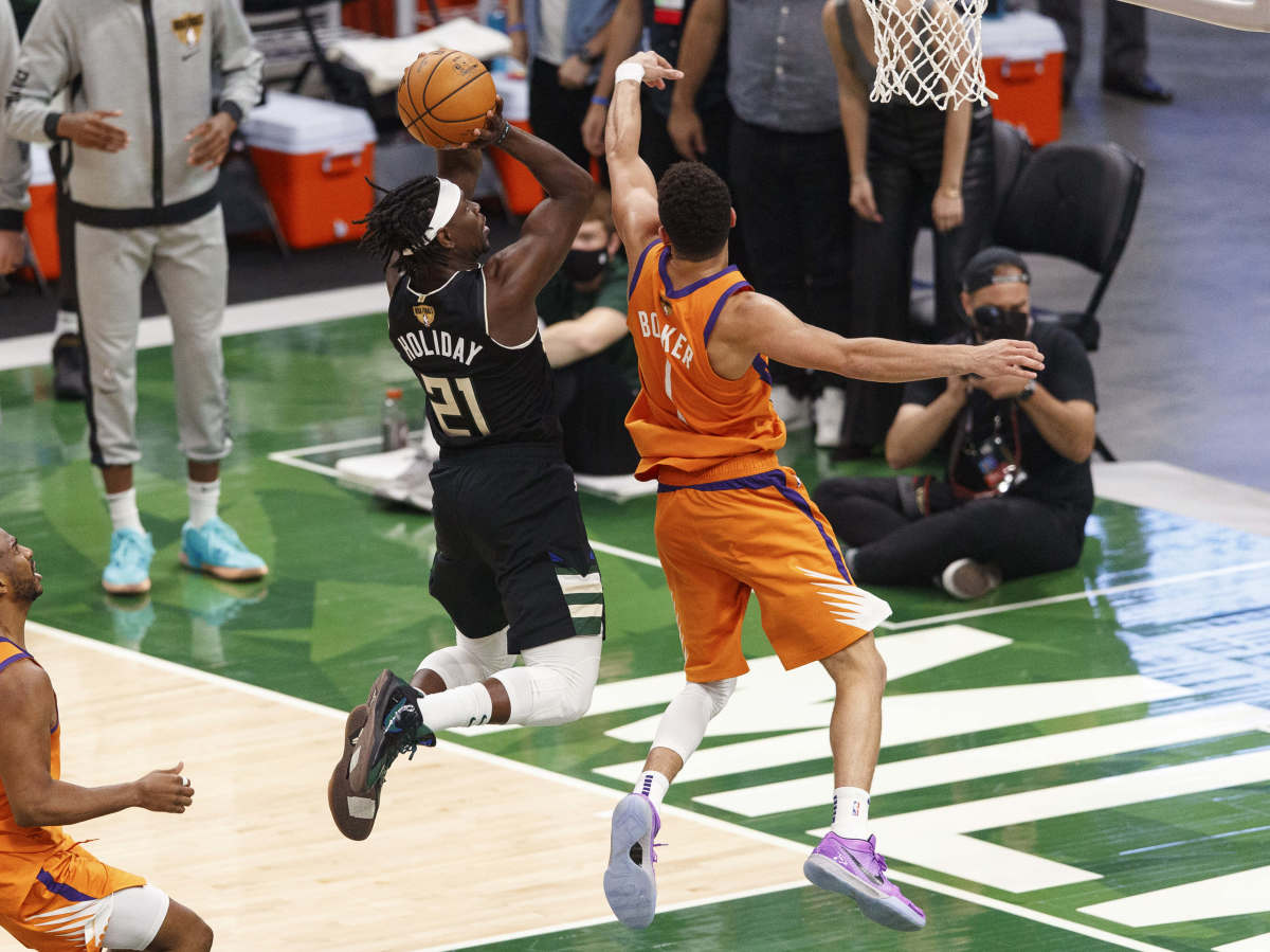 Jrue Holiday helps Milwaukee Bucks secure first NBA Championship in 50