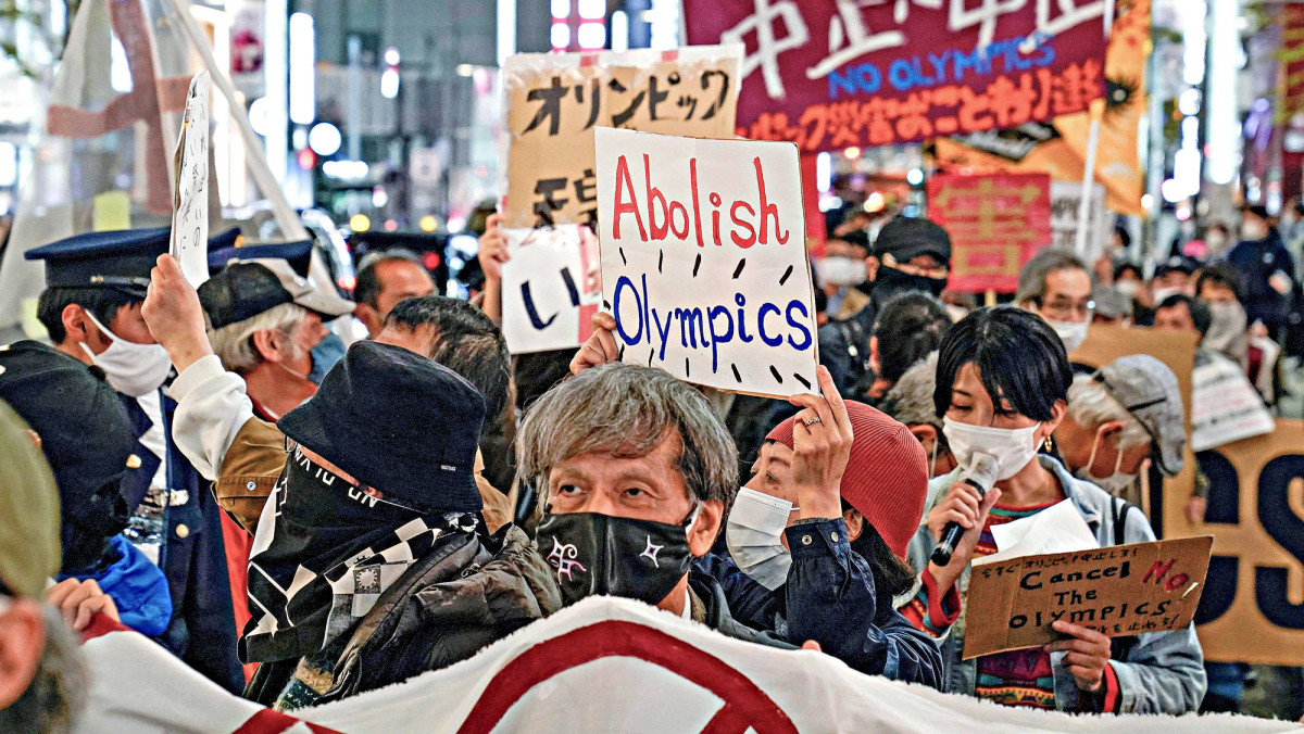 Anti-Olympic demonstrators took to the streets of Tokyo in March after the torch relay began.undefined