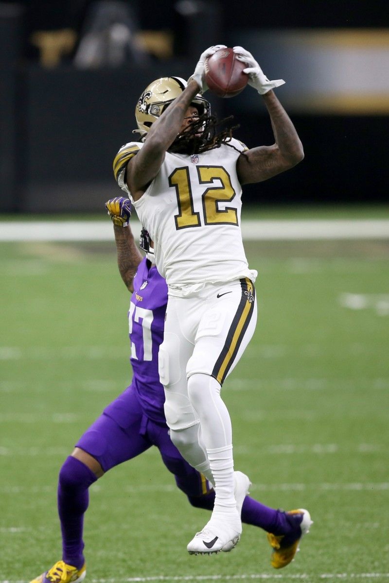 Marquez Callaway Leaps to Catch Football Over Vikings Defender
