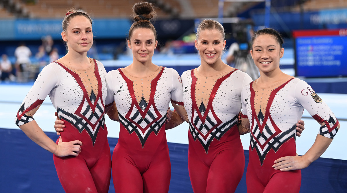 25 July 2021, Japan, Tokio: Gymnastics: Olympics, preliminary competition, vault, women, qualification at Ariake Gymnastics Centre. Germany's Sarah Voss and Paulina Schäfer, Elisabeth Seitz and Kim Bui (l-r) after the competition.