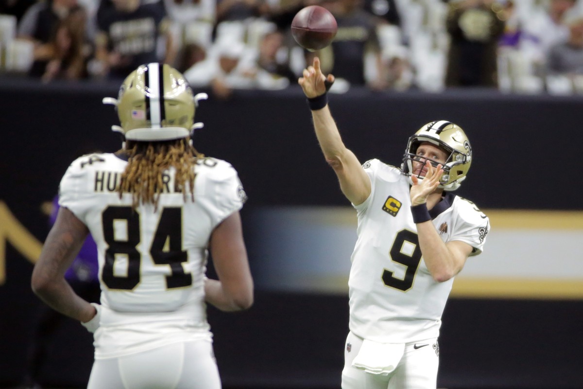 New Orleans quarterback Drew Brees (9) throws a warm up pass to receiver Lil'Jordan Humphrey (84) before a NFC Wild Card playoff football game against the Vikings. Mandatory Credit: Derick Hingle-USA TODAY Sports