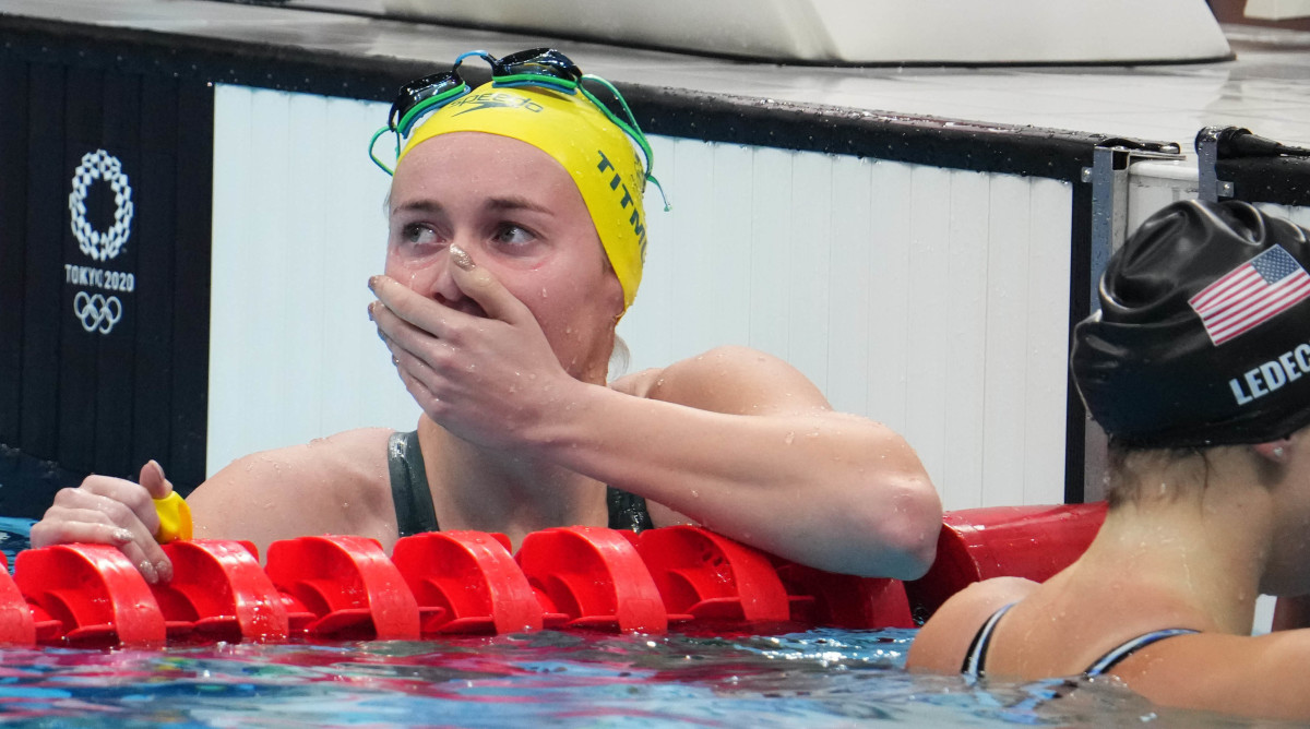 Swimmer Ariarne Titmus's reaction to coach Dean Boxall's celebration