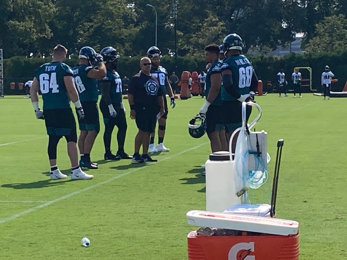 Jeff Stoutland gives instruction to his OL on July 28, 2021
