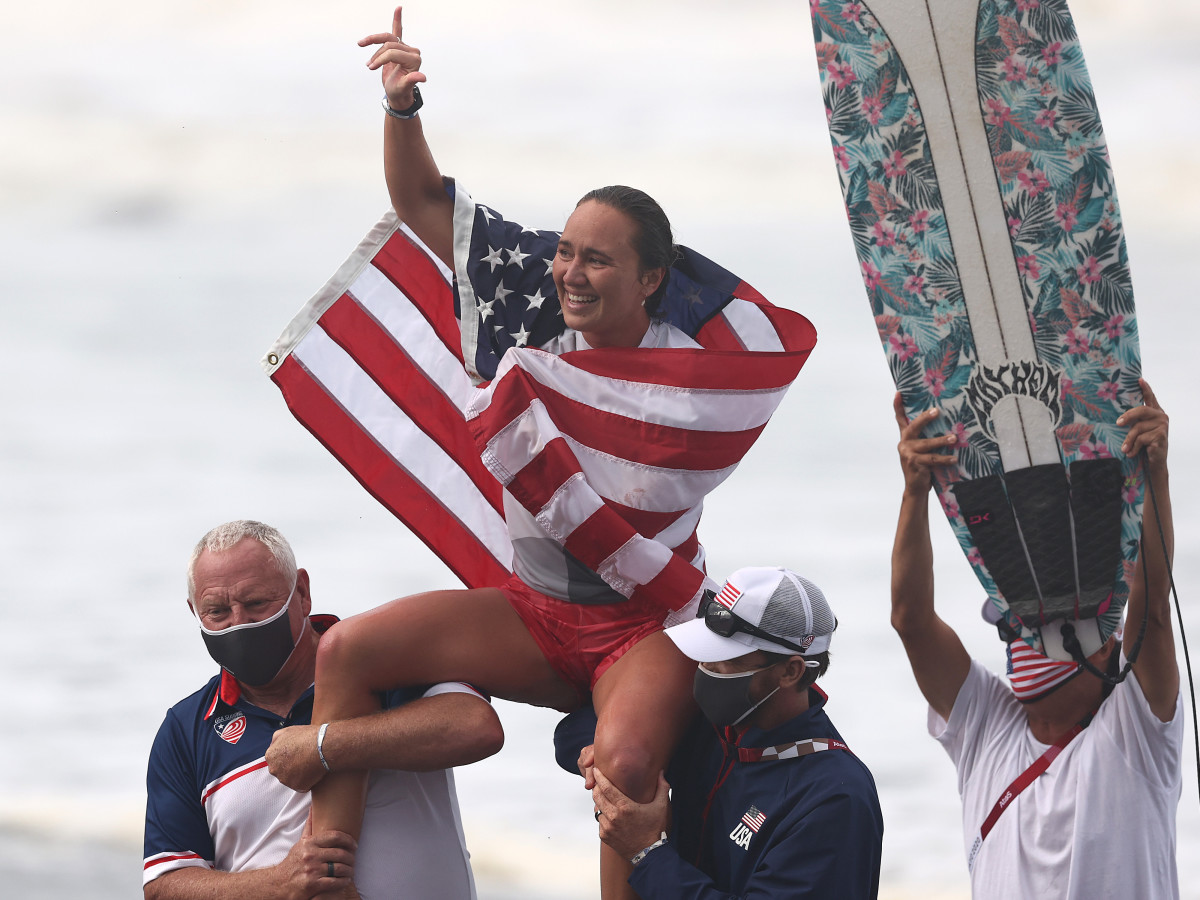 Carissa Moore of Team United States celebrates winning the Gold Medal after her final match against Bianca Buitendag of Team South Africa on day four of the Tokyo 2020 Olympic Games at Tsurigasaki Surfing Beach on July 27, 2021 in Ichinomiya, Chiba, Japan.