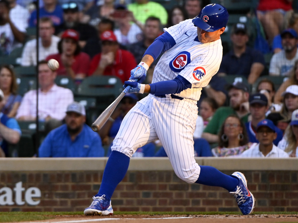 Jul 26, 2021; Chicago, Illinois, USA;  Chicago Cubs first baseman Anthony Rizzo (44) hits a two run home run against the Cincinnati Reds during the first inning at Wrigley Field.