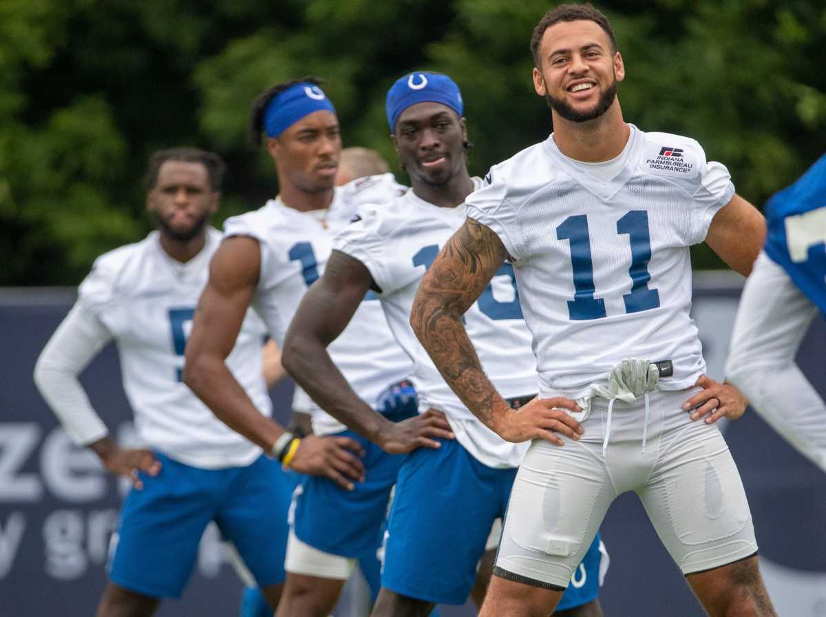 Indianapolis Colts wide receiver Michael Pittman (11) stretches with teammates at the start of practice at Grand Park in Westfield on Thursday, July 29, 2021, on the second full day of workouts of this summer's Colts training camp. Colts Camp Revs Up