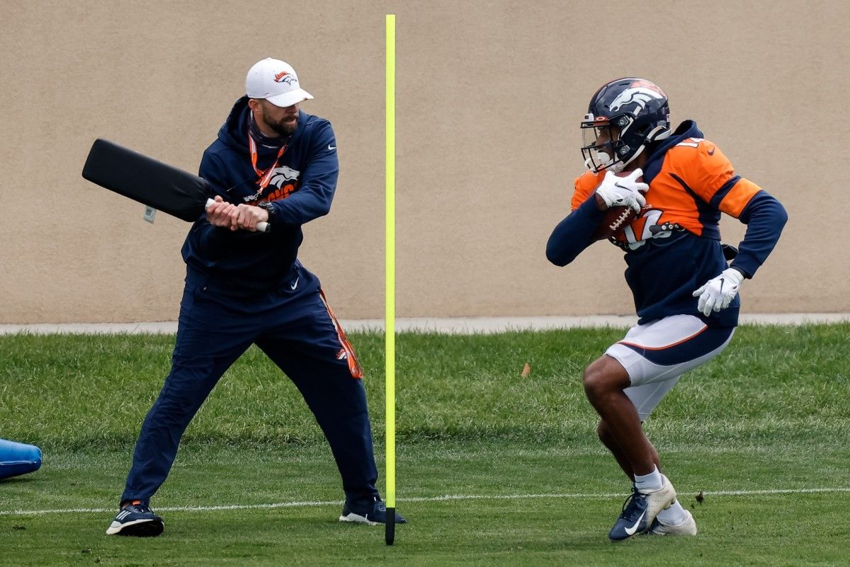 Denver Broncos wide receiver Trinity Benson (12) runs a drill during practice at UCHealth Training Center.