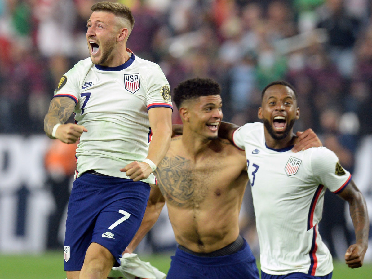 USMNT's Paul Arriola, Miles Robinson and Kellyn Acosta celebrate a Gold Cup triumph