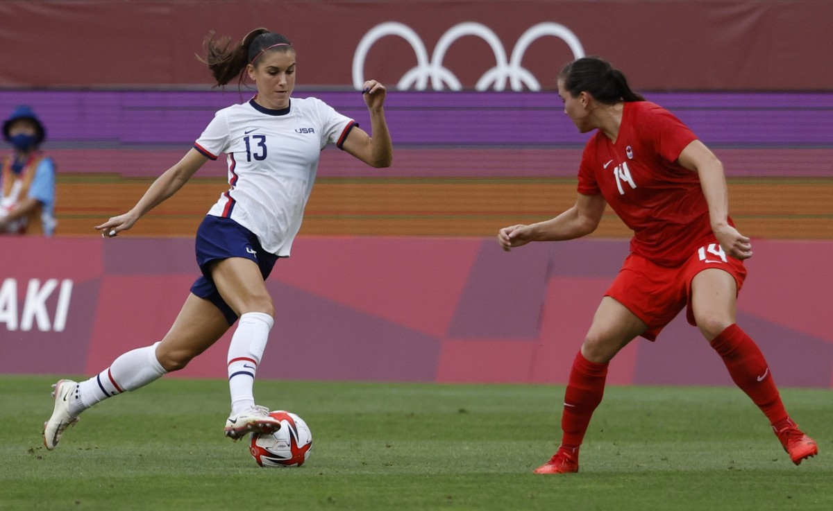 Alex Morgan (13) in Monday's semifinal game. Photo by Geoff Burke, USA Today