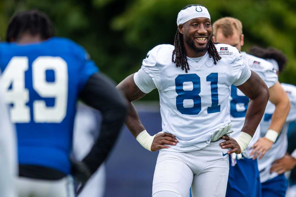 Indianapolis Colts tight end Mo Alie-Cox (81) laughs with a teammate as he stretches during practice Saturday, July 31, 2021.