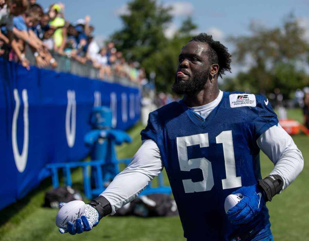 Indianapolis Colts defensive end Kwity Paye (51) tosses a souvenir ball to a fan at Grand Park in Westfield on Monday, August 2, 2021, on the second week of workouts of this summer's Colts training camp. Head Coach Frank Reich reappeared at practice after being away for ten days after a COVID-19 positive test. Colts Get Their Coach Back On Week Two Of Colts Camp