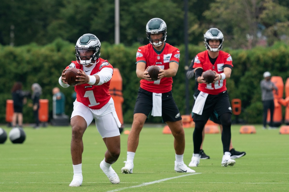 Jalen Hurts, Joe Flacco, and Nick Mullens go through a training camp practice