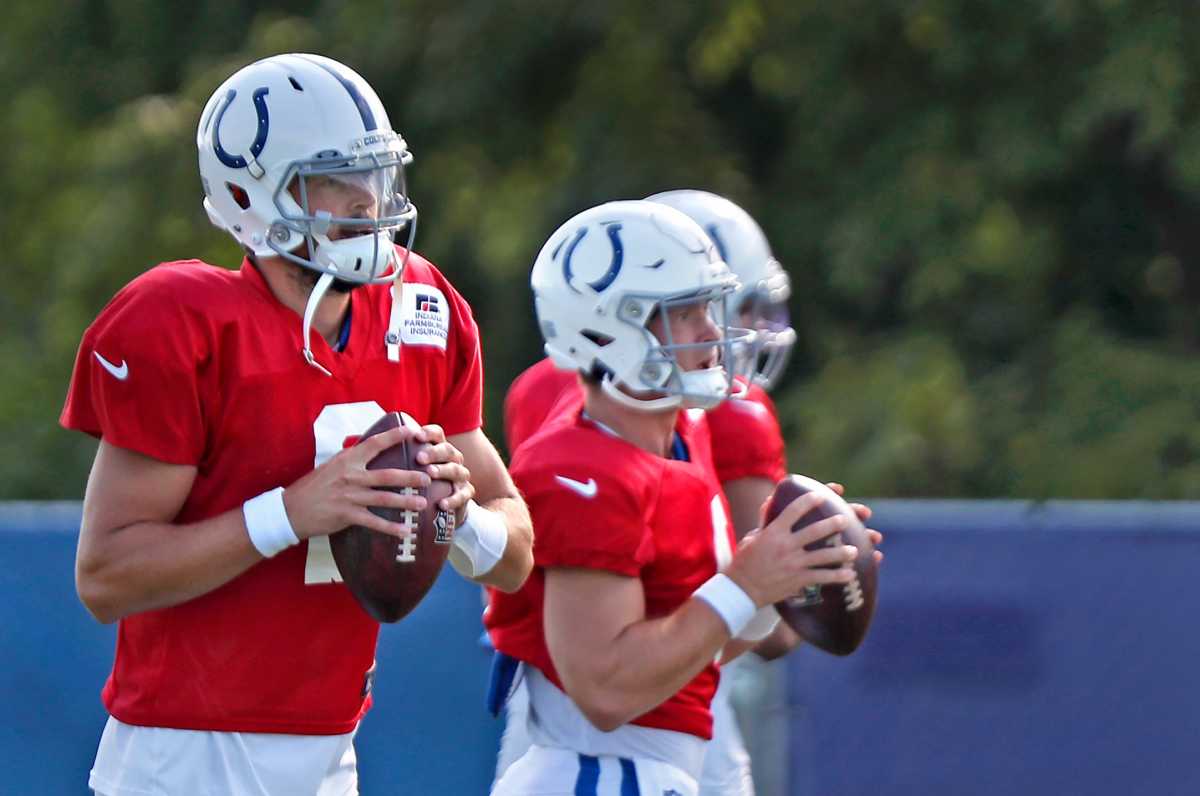 Colts quarterbacks, including #9 Jacob Eason, left, run drills during Colts training camp practice Tuesday, Aug. 3, 2021 at Grand Park in Westfield. Colts Training Camp