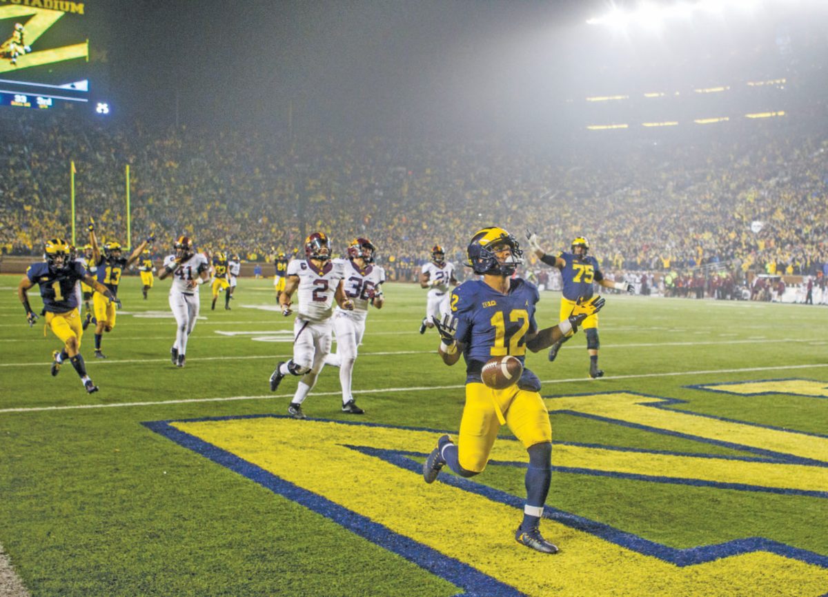 Michigan running back Chris Evans finds the end zone
