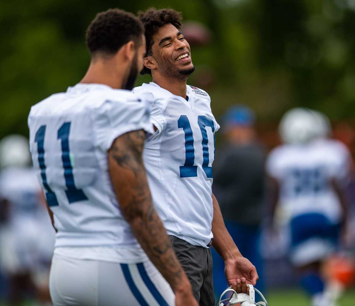 Indianapolis Colts wide receivers Dezmon Patmon (10) and Michael Pittman (11) share a laugh before practice Saturday, July 31, 2021.