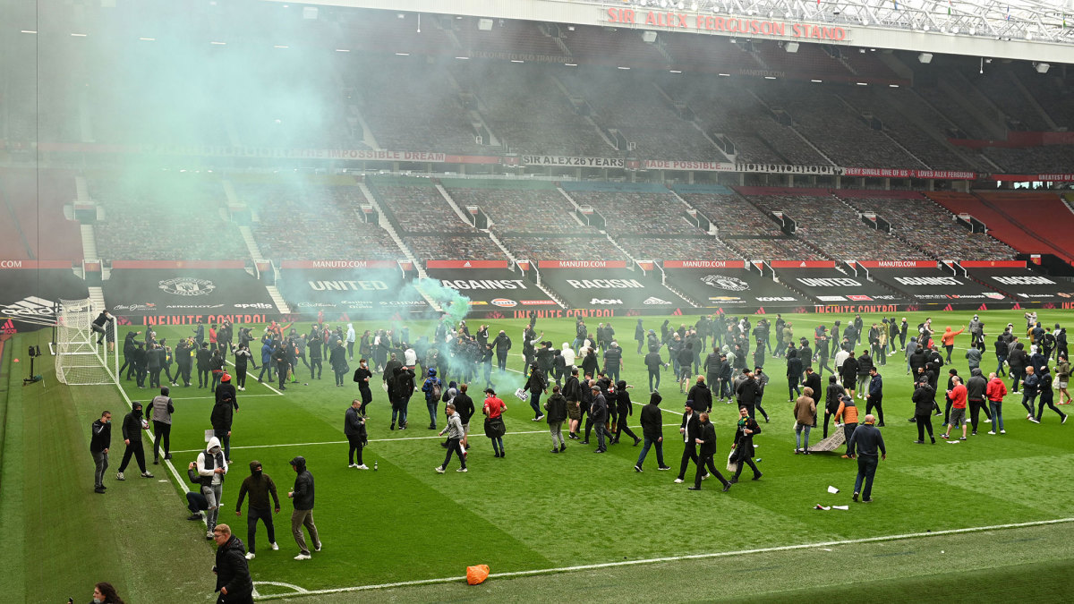 Manchester United fans storm Old Trafford