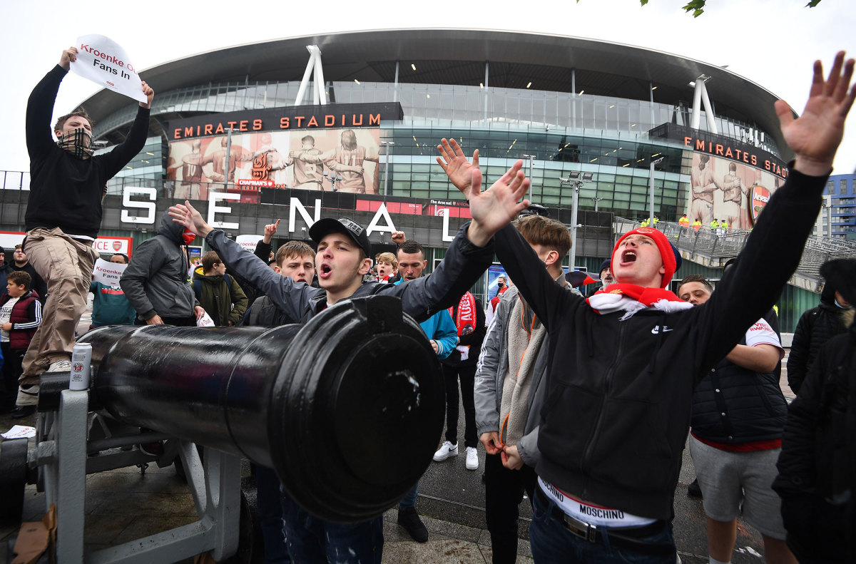 Arsenal fans outside the Emirates Stadium protest owner Stan Kroenke