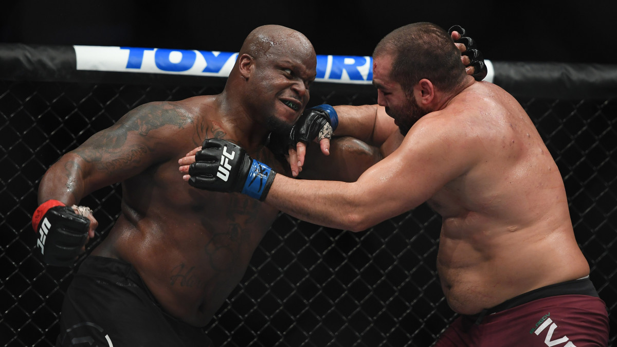 Derrick Lewis throws a punch in a UFC fight