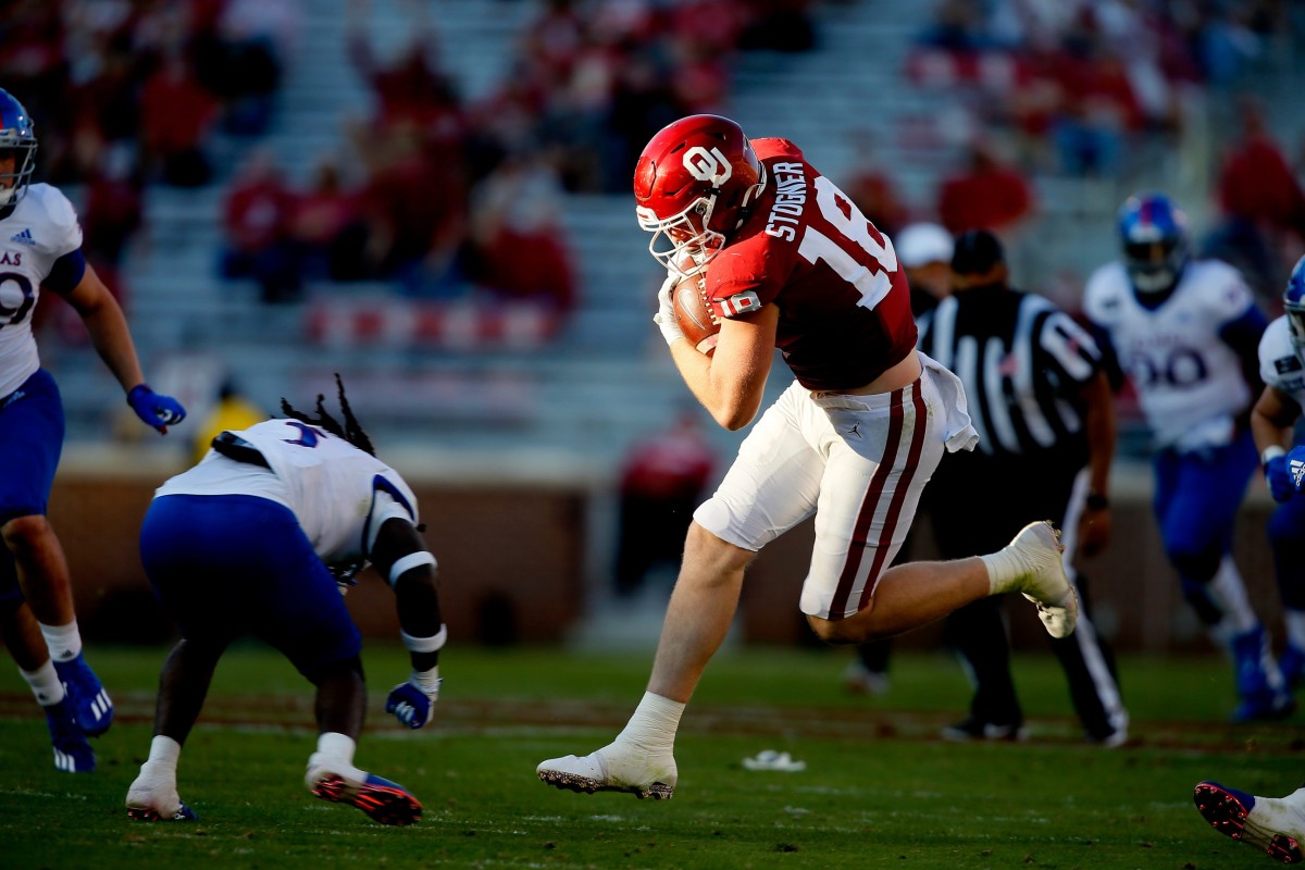 OU's Austin Stogner (18) runs after a reception during a 62-9 win against Kansas in Norman on Nov. 7, 2020.