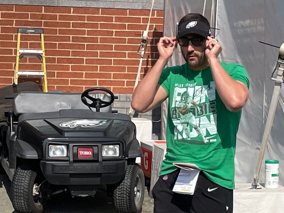 Nick Sirianni emerges from the medical tent (sun screen).
