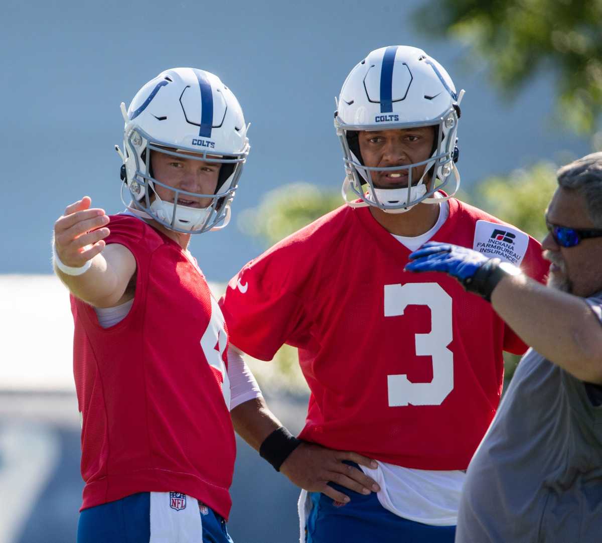 Indianapolis Colts quarterback Sam Ehlinger (4) and Indianapolis Colts quarterback Brett Hundley (3) talk things over at Grand Park in Westfield on Monday, August 2, 2021, on the second week of workouts of this summer's Colts training camp. Head Coach Frank Reich reappeared at practice after being away for ten days after a COVID-19 positive test. Colts Get Their Coach Back On Week Two Of Colts Camp