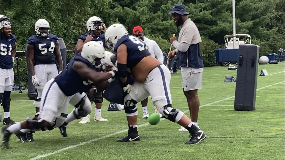 Defensive tackle Fatorma Mulbah (left) during a blocking drill.