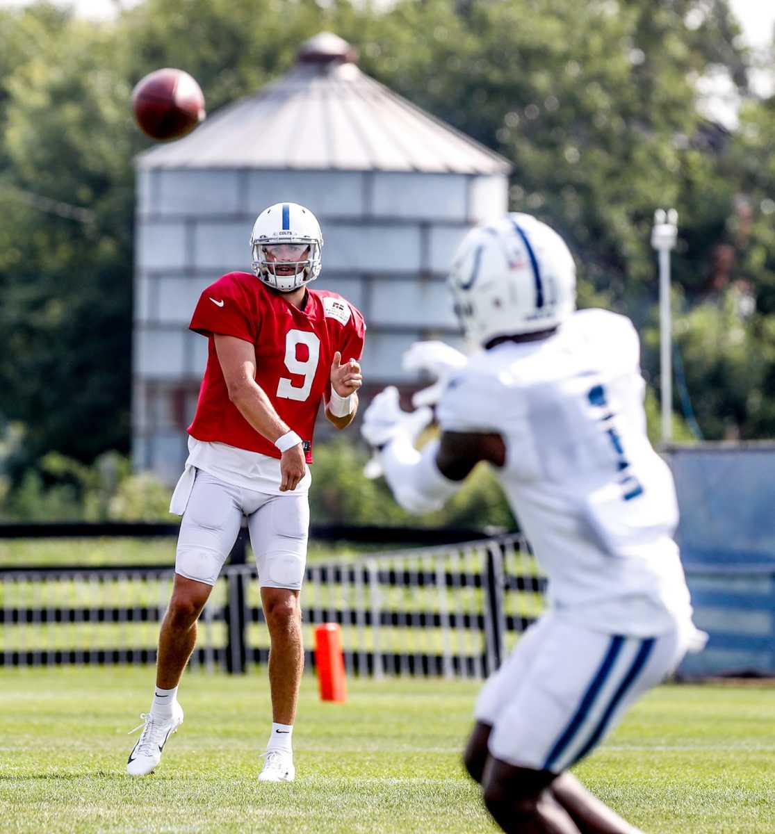 The Indianapolis Colts quarterback Jacob Eason (9) throws to wide receiver Parris Campbell (1) during Colts Camp practice on Sunday, August 8, 2021, at Grand Park in Westfield, Ind.