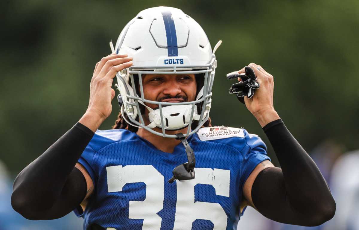The Indianapolis Colts' Andre Chachere (36) puts his helmet on during the Indianapolis Colts camp on Friday, July 30, 2021, at Grand Park in Westfield Ind.