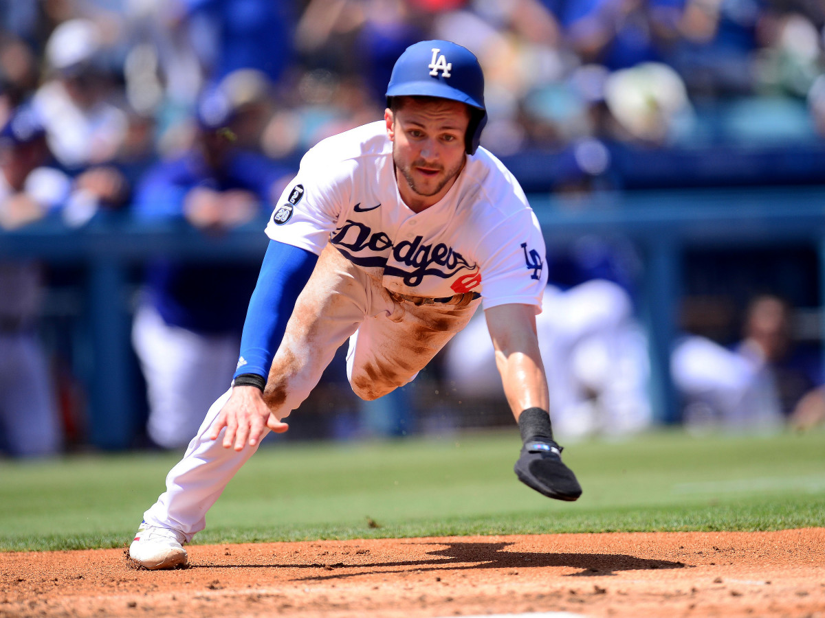 Aug 8, 2021; Los Angeles, California, USA; Los Angeles Dodgers second baseman Trea Turner (6) scores a run against the Los Angeles Angels during the second inning at Dodger Stadium.