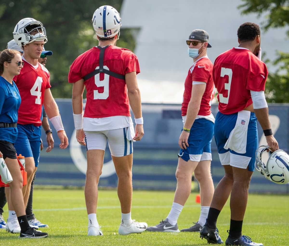 Indianapolis Colts quarterback Carson Wentz (second from right) with other quarterbacks at Grand Park in Westfield on Monday, August 10, 2021, on the third week of workouts of this summer's Colts training camp. Wentz Back At Colts Camp