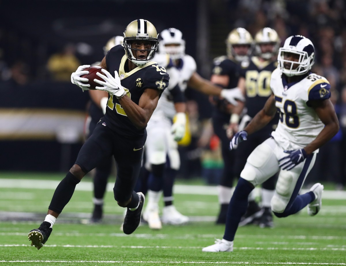 New Orleans Saints receiver Michael Thomas (13) runs after a reception against the Los Angeles Rams. Mandatory Credit: Matthew Emmons-USA TODAY Sports