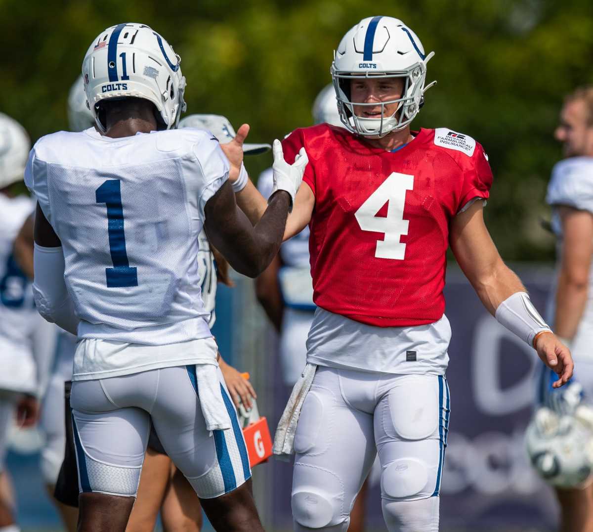 Indianapolis Colts quarterback Sam Ehlinger (4) gets ready for a one-on-one drill against the Carolina Panthers alongside Colts wide receiver Parris Campbell (1) on Friday, Aug. 13, 2021. Indianapolis Colts Host Carolina Panthers At Grand Park In Westfield Ind
