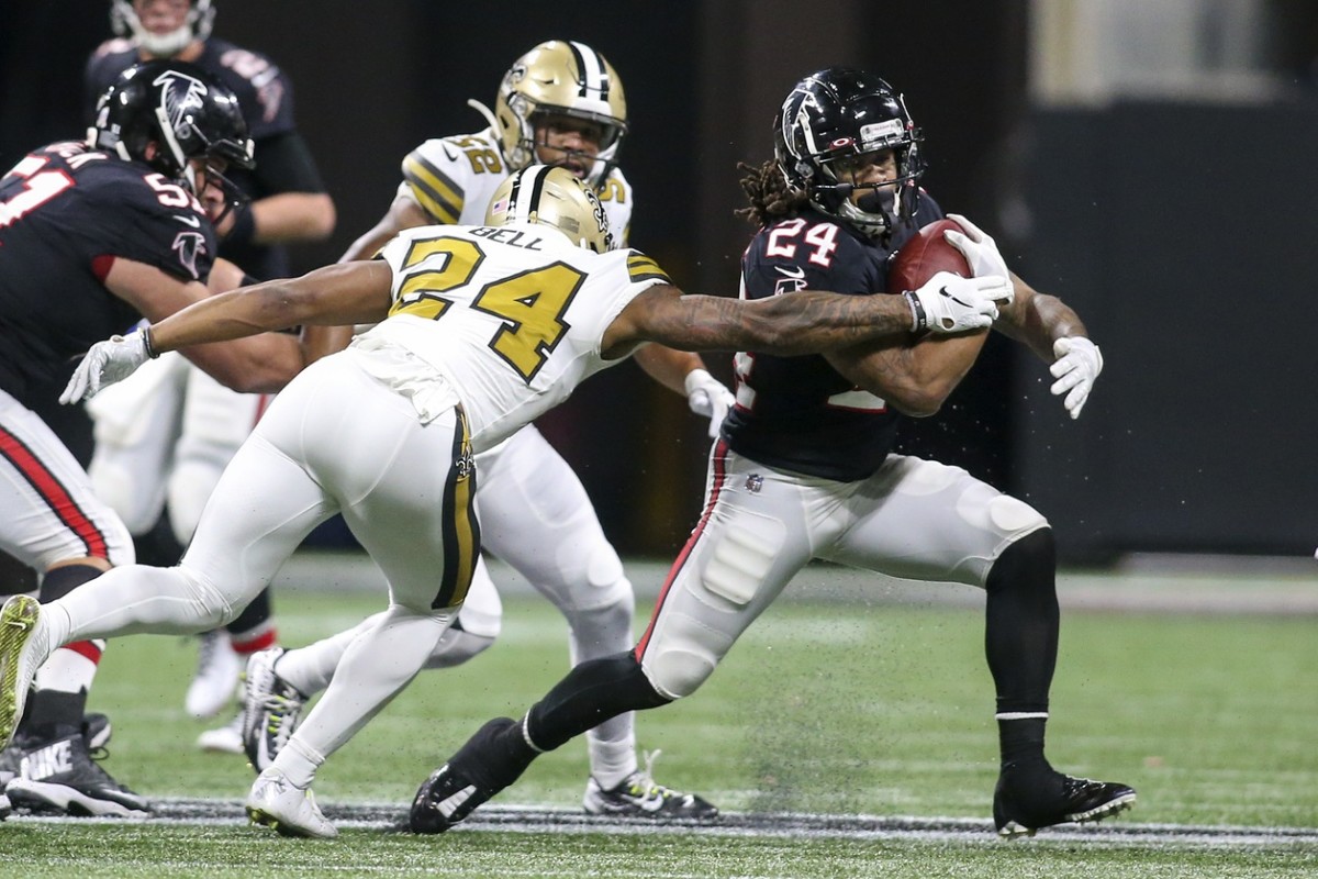 Nov 28, 2019; Atlanta Falcons running back Devonta Freeman (24) runs the ball against the New Orleans Saints. Mandatory Credit: Brett Davis-USA TODAY Sports