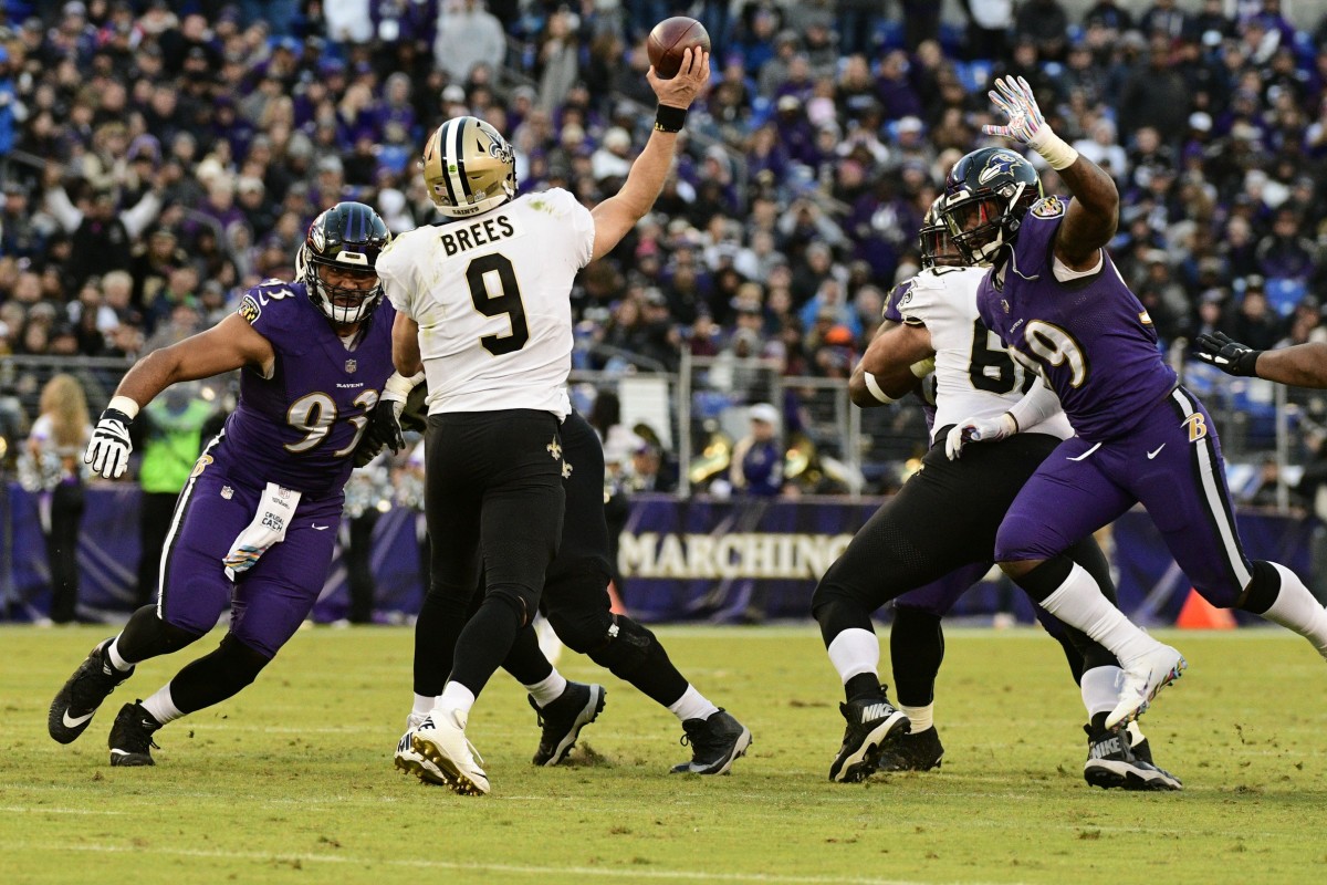 Oct 21, 2018; Baltimore, MD, USA; New Orleans Saints quarterback Drew Brees (9) throws under pressure from the Baltimore Ravens defense. Mandatory Credit: Tommy Gilligan-USA TODAY 