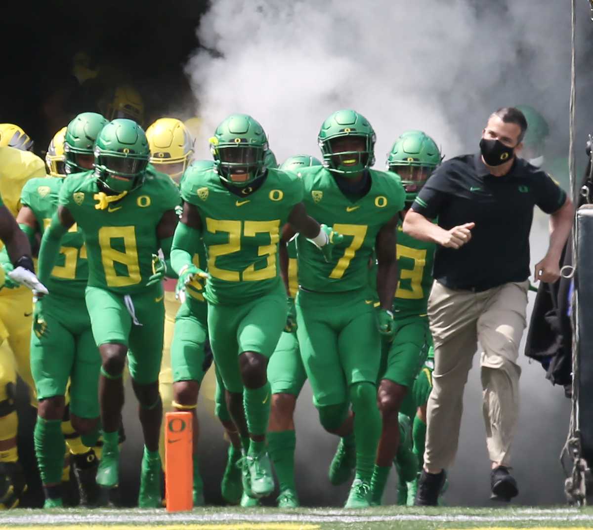 Oregon Head Coach Mario Cristobal Leads the Ducks out of the Tunnel