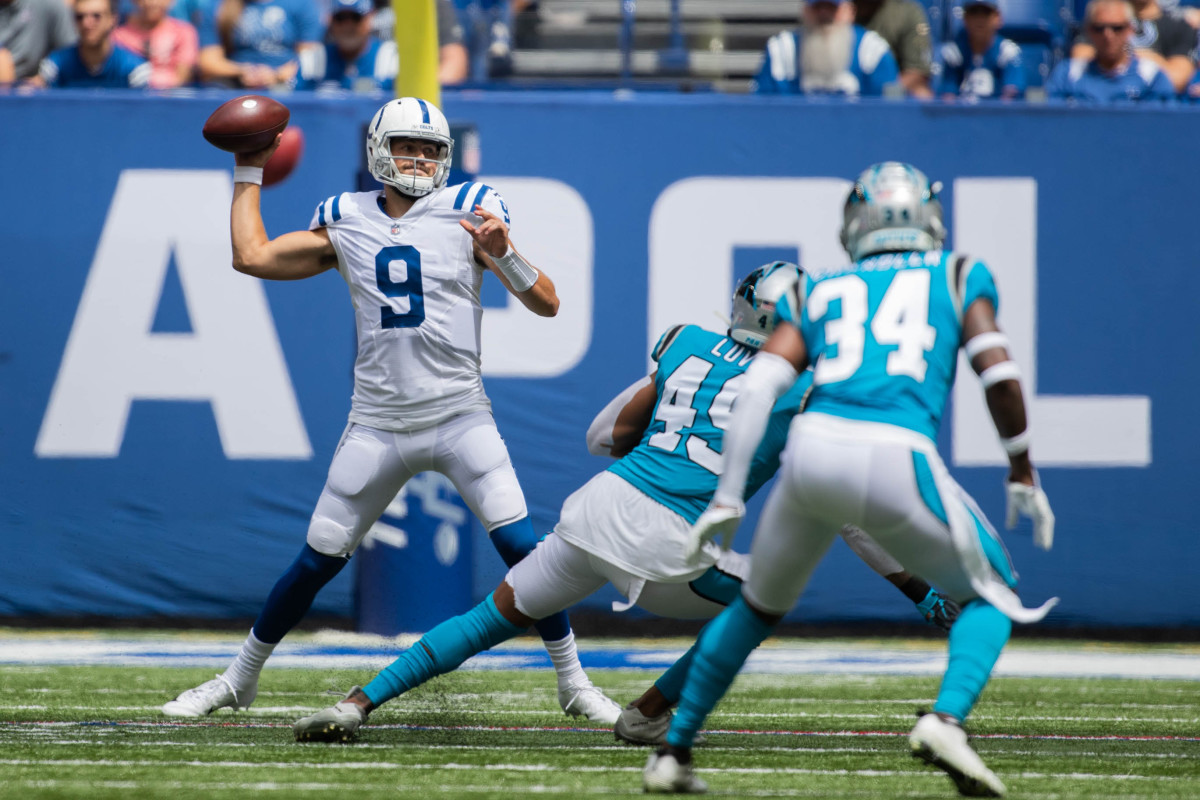 Aug 15, 2021; Indianapolis, Indiana, USA; Indianapolis Colts quarterback Jacob Eason (9) passes the ball in the first quarter against the Carolina Panthers at Lucas Oil Stadium.