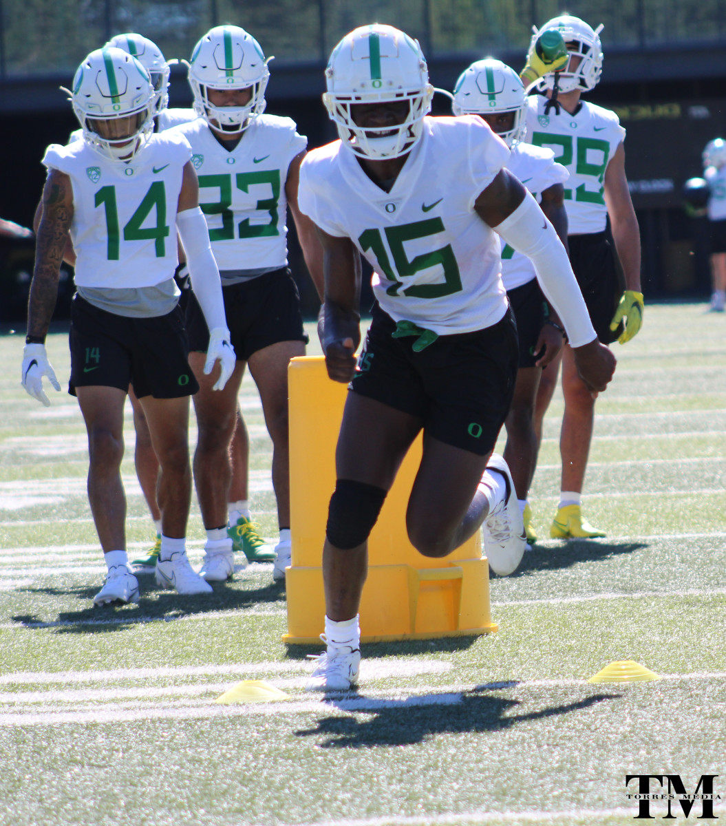 Brevard goes through wide receiver release drills at Oregon fall camp.