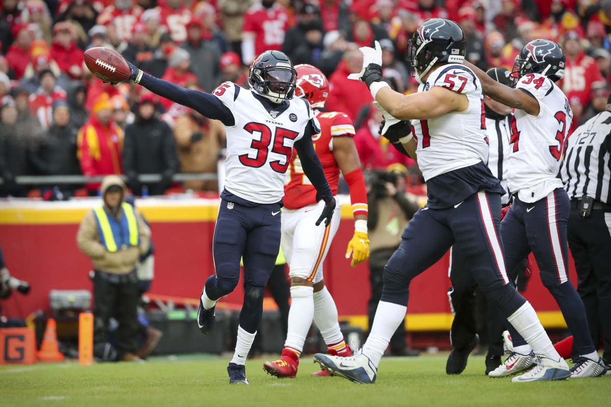 Jan 12, 2020; Kansas City, MO, USA; Houston Texans cornerback Keion Crossen (35) recovers a Kansas City Chiefs fumble during the first quarter in a AFC Divisional Round playoff football game at Arrowhead Stadium.