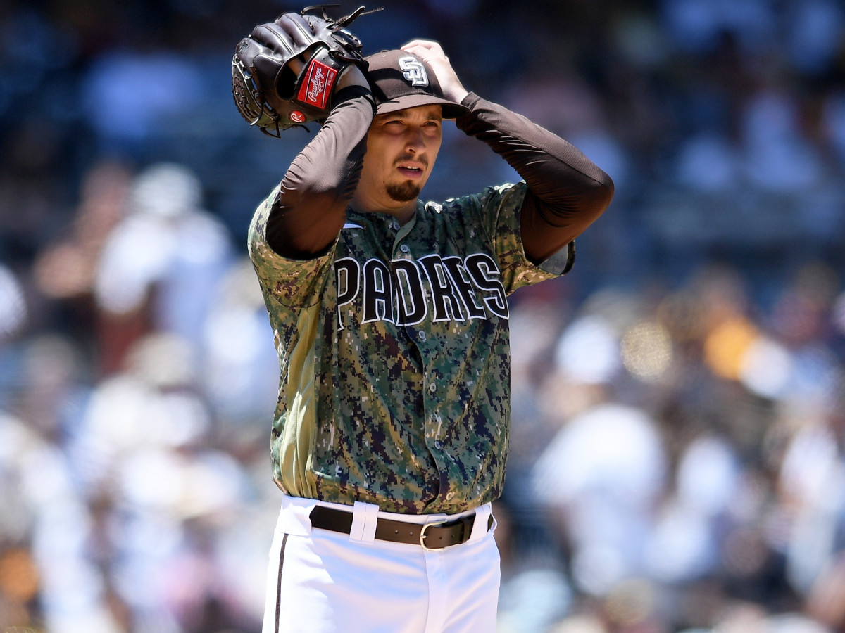 Aug 8, 2021; San Diego, California, USA; San Diego Padres starting pitcher Blake Snell (4) adjusts his cap after issuing a walk to an Arizona Diamondbacks batter during the fourth inning at Petco Park.