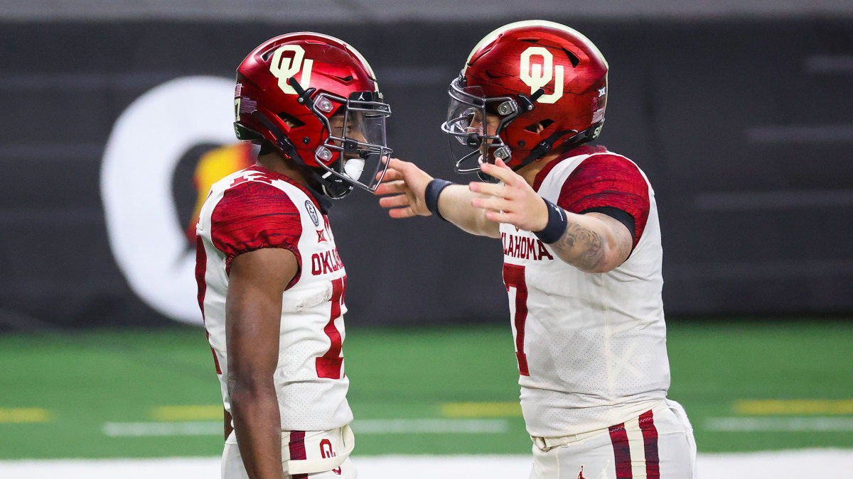 Oklahoma's Marvin Mims and Spencer Rattler