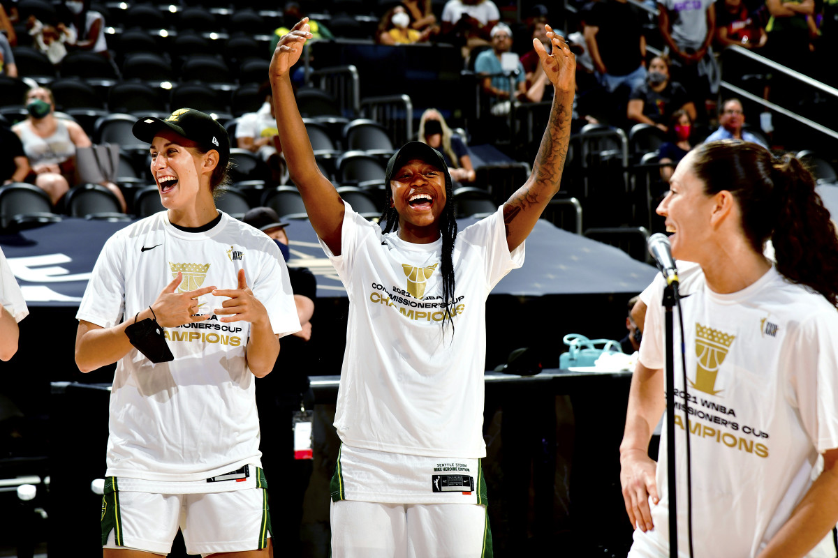 Stephanie Talbot, Jewell Loyd and Sue Bird celebrate winning the Commissioner's Cup