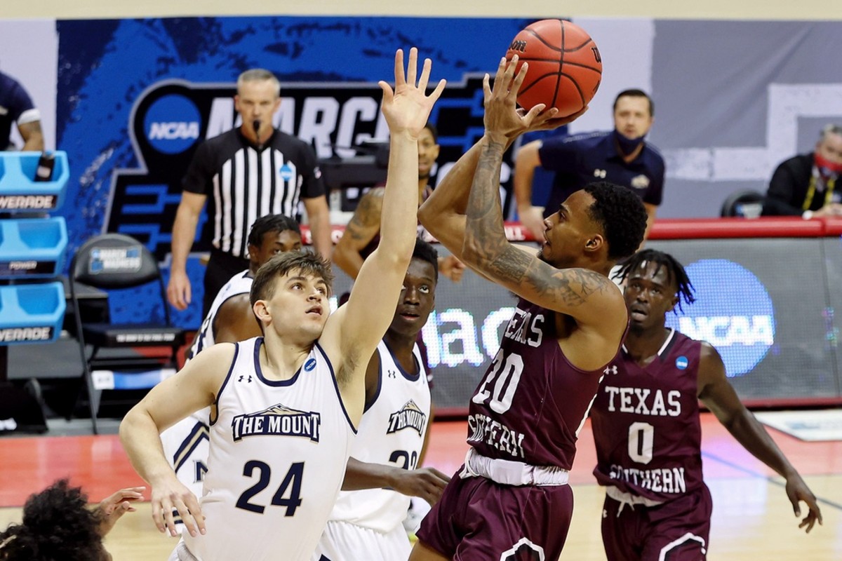 Mar 18, 2021; Bloomington, Indiana, USA; Texas Southern Tigers guard Michael Weathers (20) shoos over Mount St. Mary's Mountaineers forward Frantisek Barton (24) during the first half in the First Four of the 2021 NCAA Tournament at Simon Skjodt Assembly Hall. Mandatory Credit: Trevor Ruszkowski-USA TODAY Sports