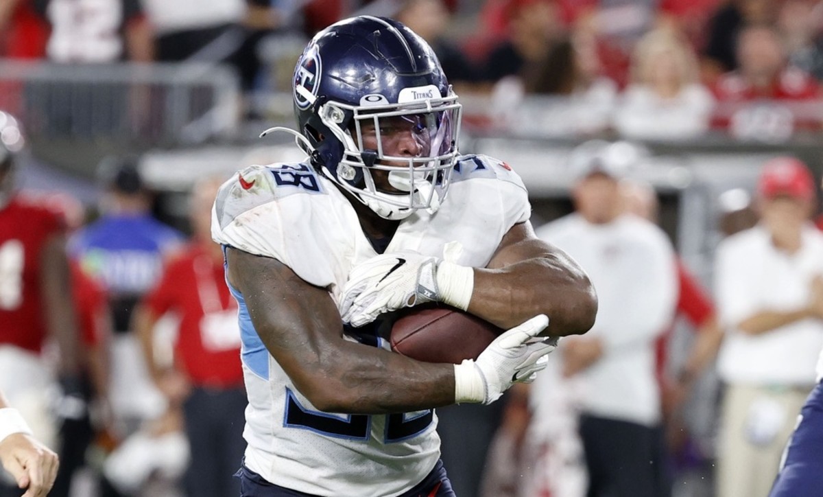Tennessee Titans running back Mekhi Sargent (38) runs the ball against the Tampa Bay Buccaneers during the second half at Raymond James Stadium.