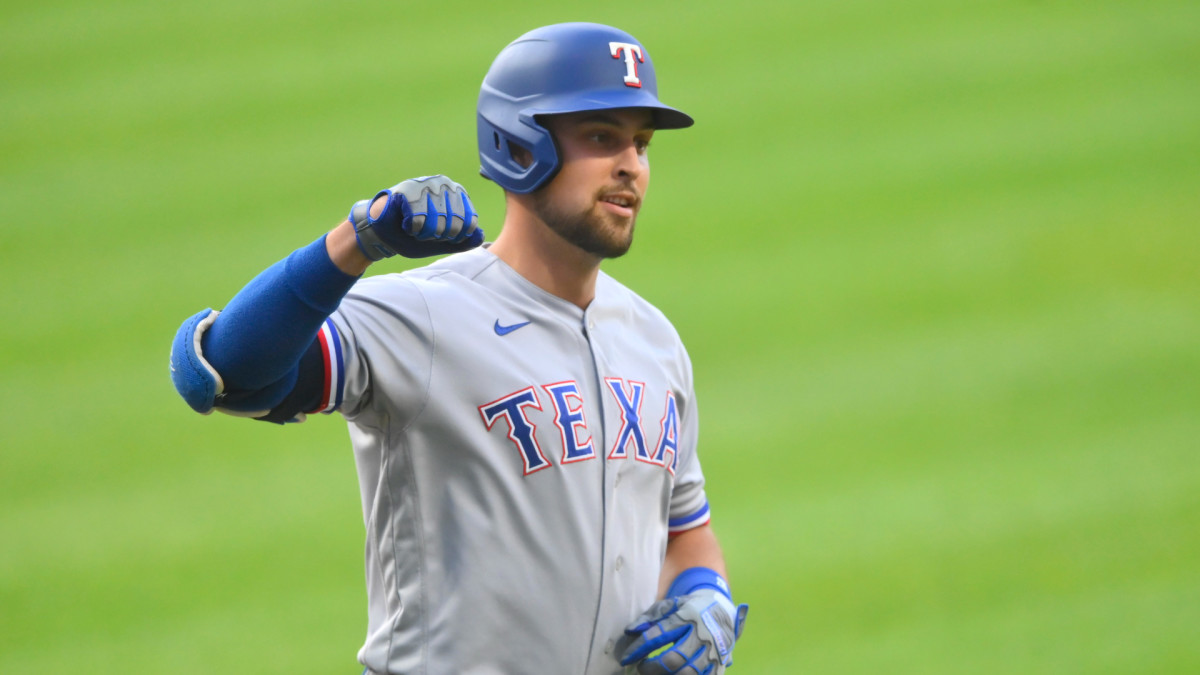 Aug 24, 2021; Cleveland, Ohio, USA; Texas Rangers first baseman Nathaniel Lowe (30) celebrates after hitting a three run home run against the Cleveland Indians in the first inning at Progressive Field.