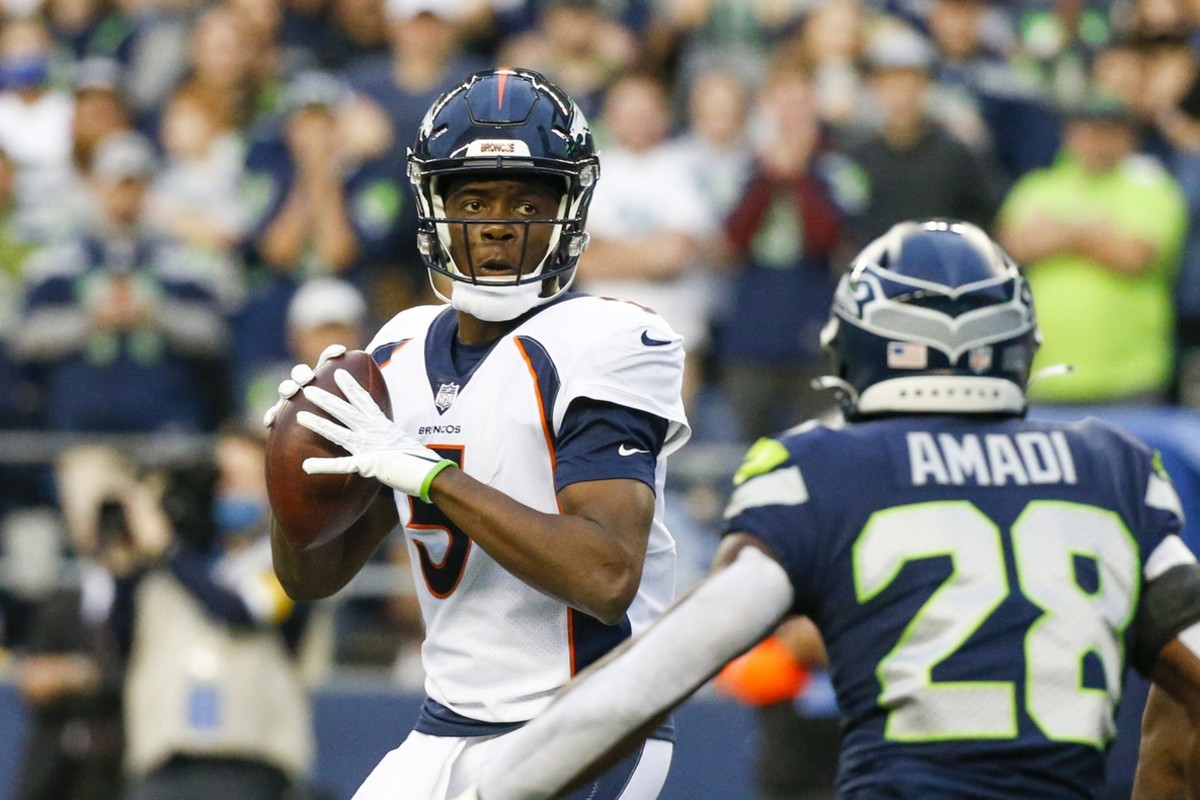 Aug 21, 2021; Seattle, Washington, USA; Denver Broncos quarterback Teddy Bridgewater (5) drops back to pass against the Seattle Seahawks during the first quarter at Lumen Field.