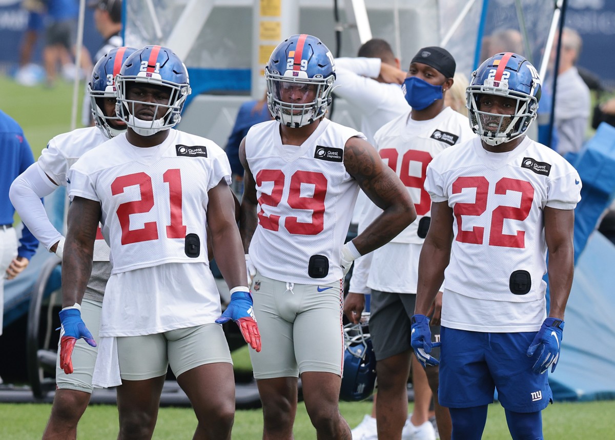 Jul 29, 2021; East Rutherford, NJ, USA; New York Giants free safety Jabrill Peppers (21) and safety Xavier McKinney (29) and cornerback Adoree' Jackson (22) look on during training camp at Quest Diagnostics Training Center.