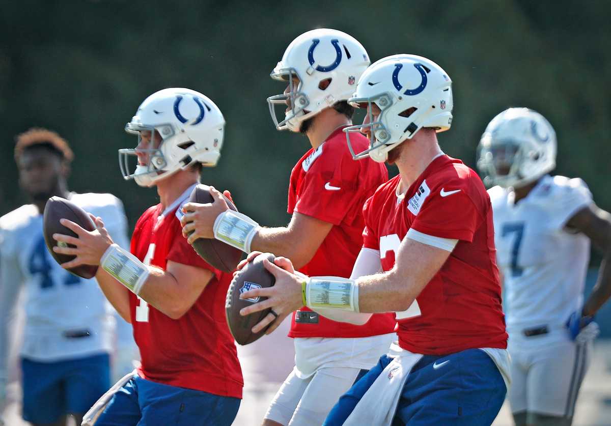 Quarterback Carson Wentz (#2), right, runs drills with other quarterbacks during Colts camp practice Tuesday, Aug. 24, 2021 at Grand Park Sports Campus in Westfield. Colts Camp Practice Continues At Grand Park Sports Campus In Westfield Tuesday Aug 24 2021