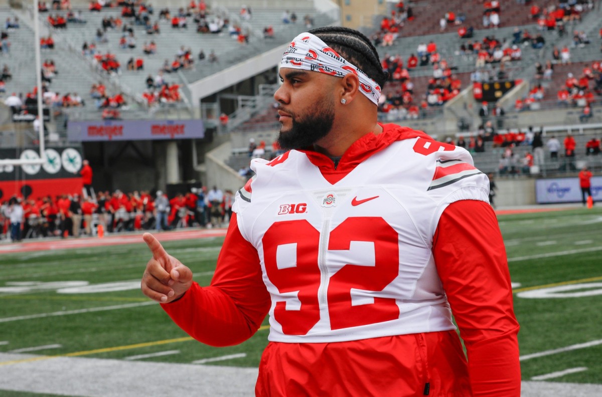 Ohio State defensive tackle Haskell Garrett has struck a marketing deal with Heartland BancCorp under new rules that allow college athletes to profit from their names, images and likenesses. O