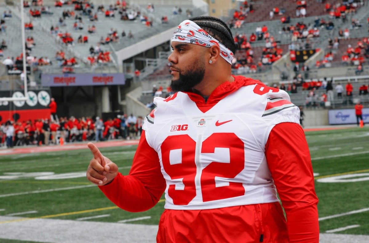 Ohio State defensive tackle Haskell Garrett has struck a marketing deal with Heartland BancCorp under new rules that allow college athletes to profit from their names, images and likenesses. O